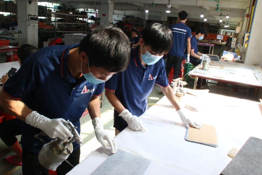 Aarons Leather production team preparing leather components in the workshop