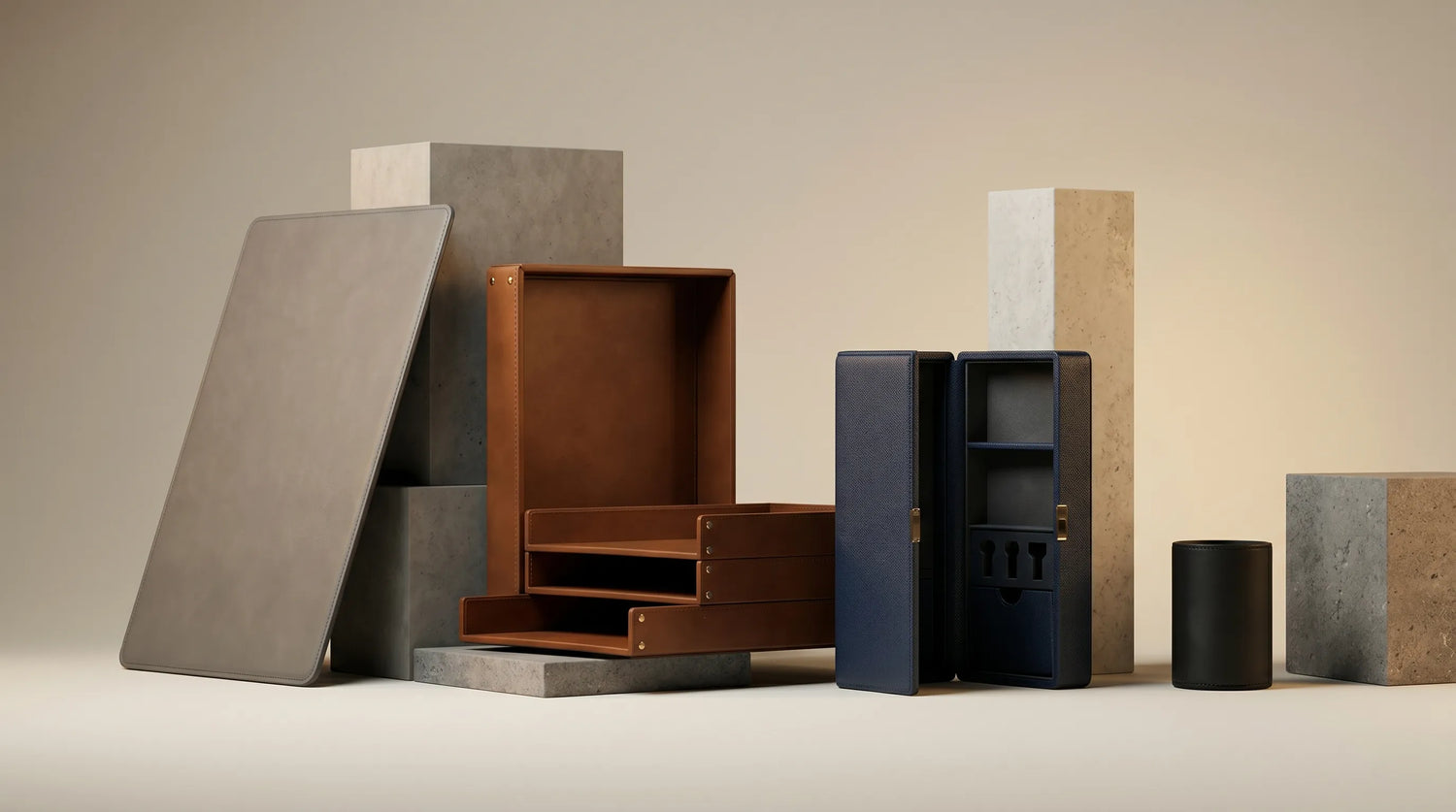 Guangzhou OEM factory custom leather desk mats and office accessories wholesale. Mineral gray full-grain leather desk pad with durable painted edges and saddle brown bridle leather stamp holder box for corporate workspace.