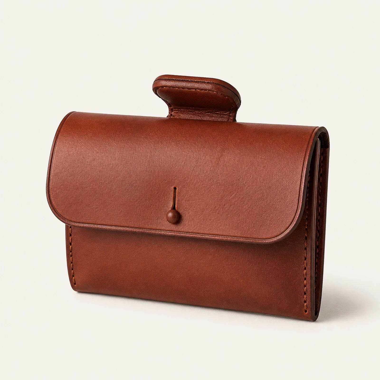 Custom chestnut leather saddle pommel bag with flap closure