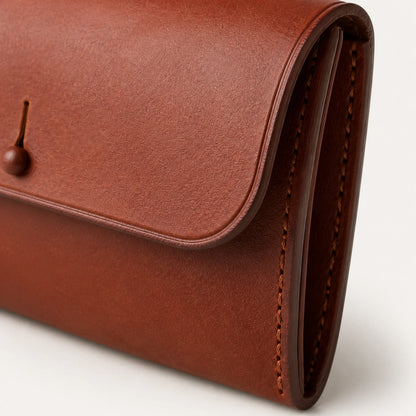 Close-up of pommel bag leather grain flap edge gusset and stitching