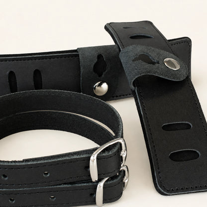 Close-up of full-grain leather stitching slots suede and silver hardware