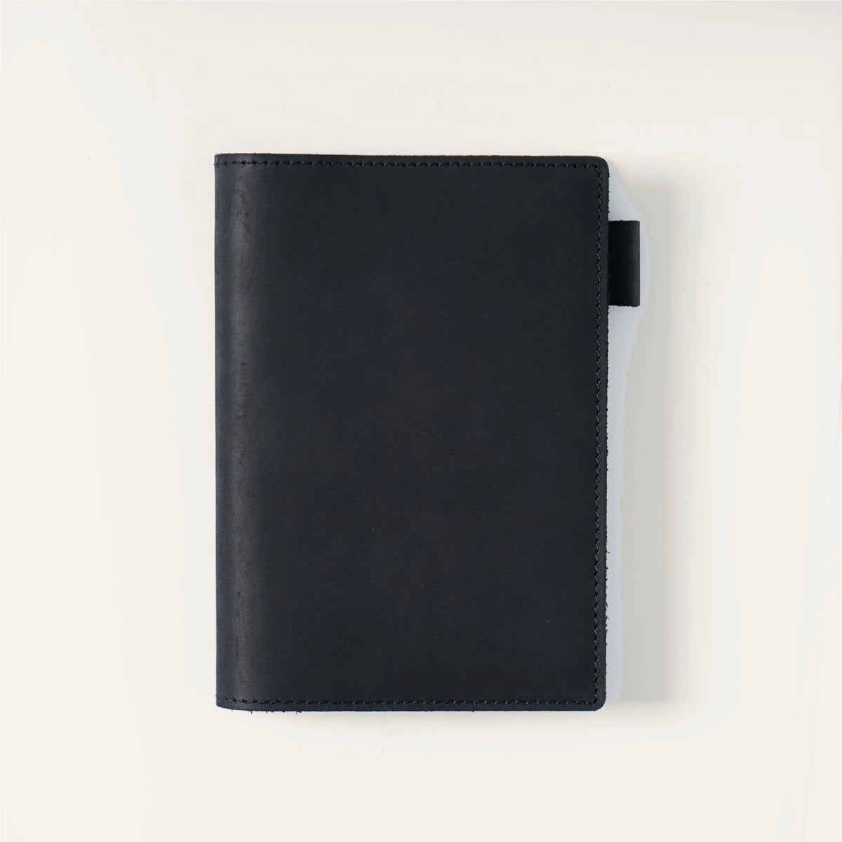 Black A6 top-grain crazy horse leather notebook cover, closed front view