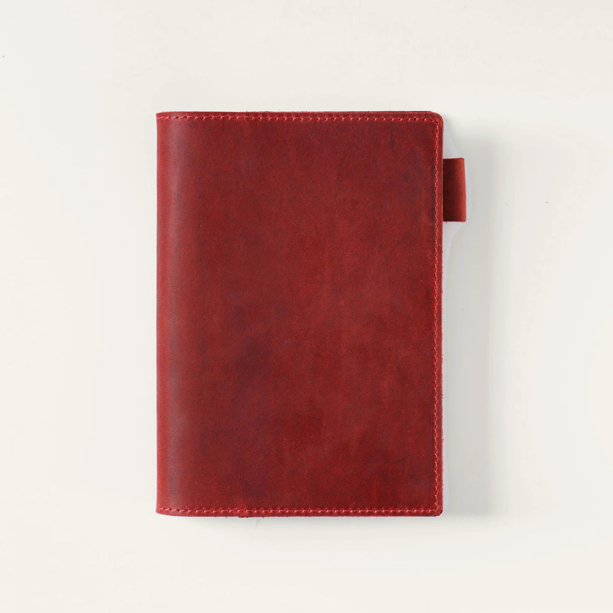 Wine red A6 top-grain crazy horse leather notebook cover, closed front view