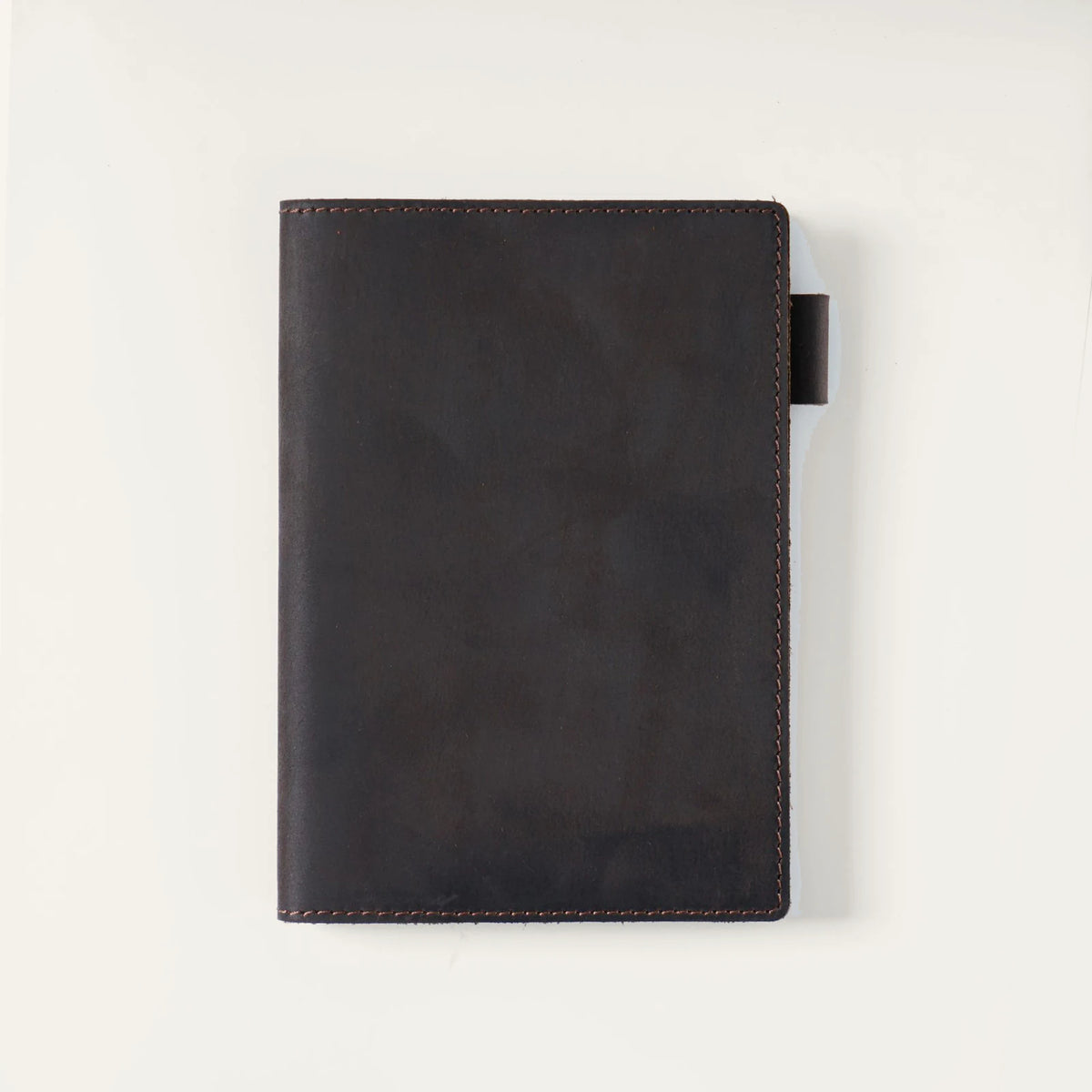 Dark coffee A6 top-grain crazy horse leather notebook cover, closed front view