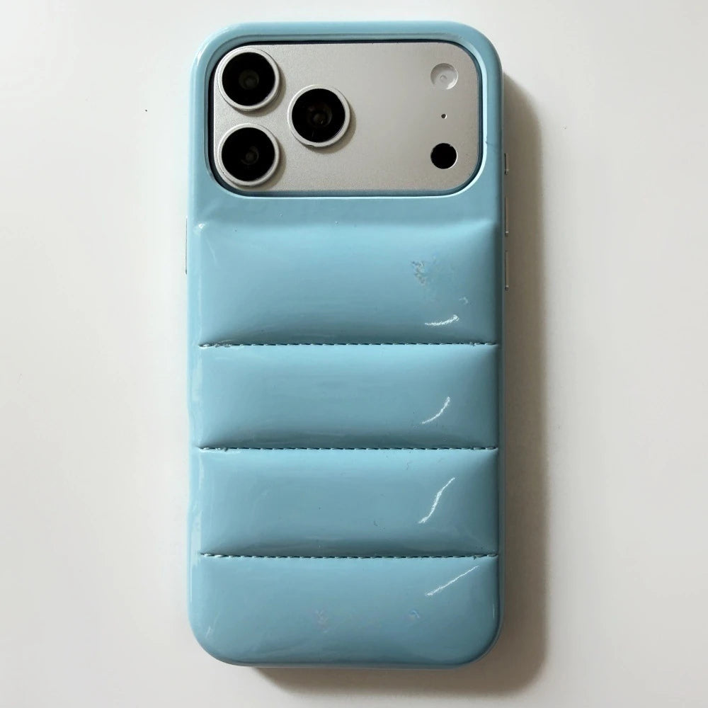 Blue Classic puffer-style phone-case reference with a smooth top edge.