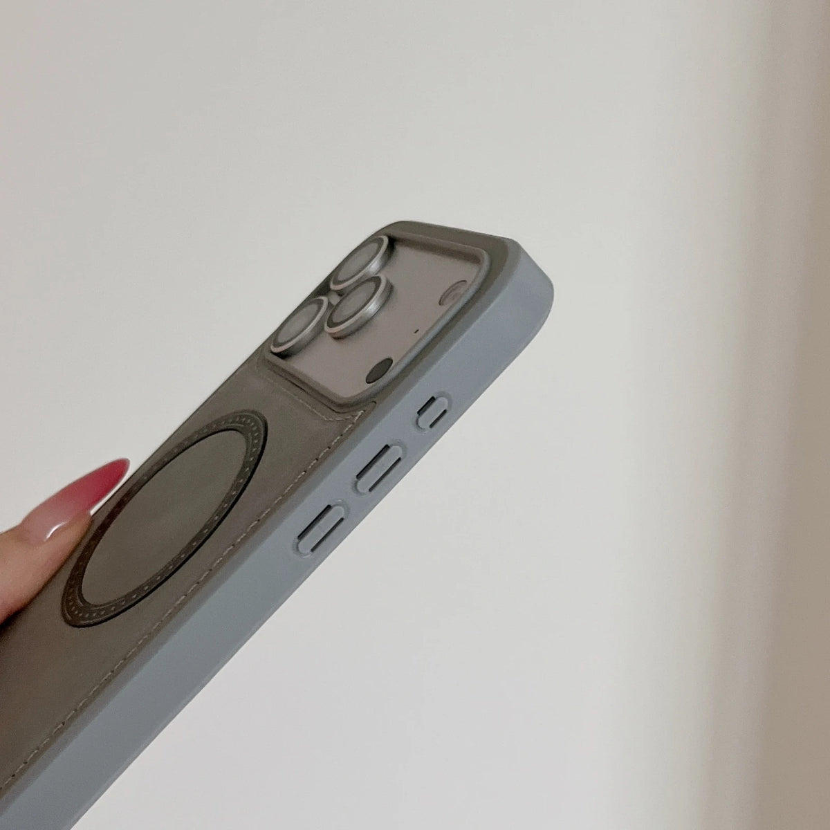Side-button and camera-edge detail of the stitched ring phone case; exact openings depend on the selected phone model