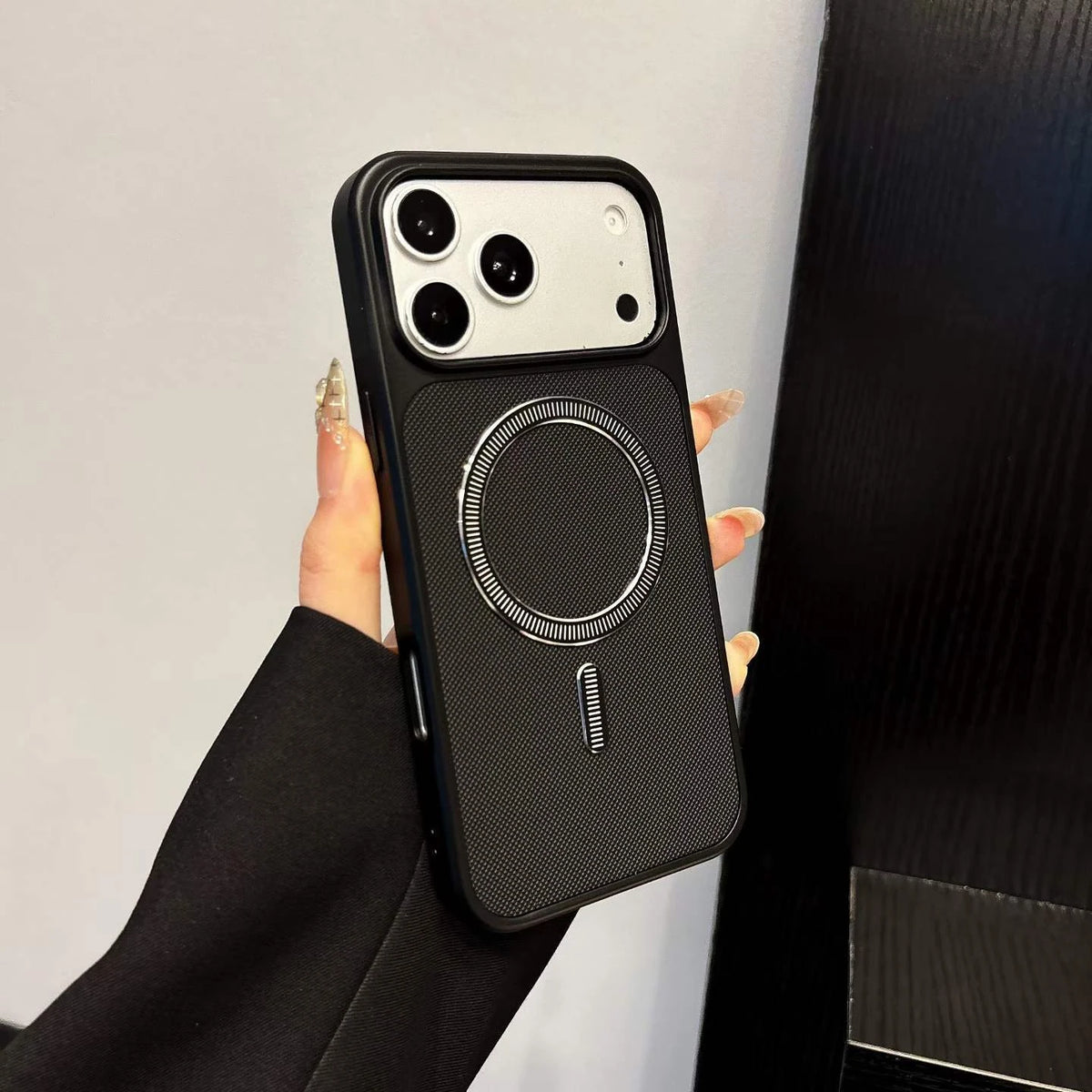 Black textured TPU phone-case style reference.