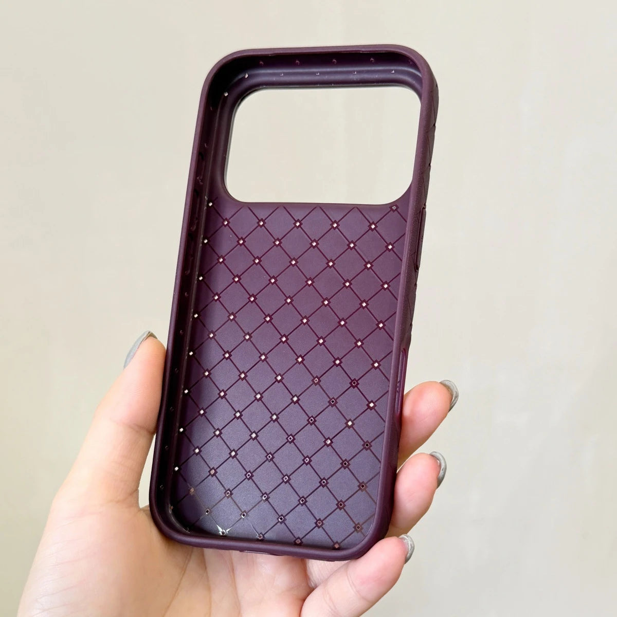 Interior and raised edge of the basketweave-texture TPU phone-case design.