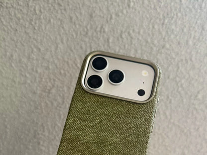 Green woven-texture PU case camera-frame close-up.