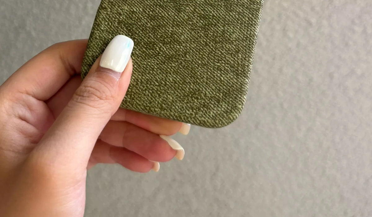 Green lower-edge and woven-look surface detail of the phone-case design.