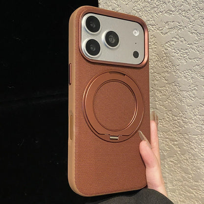 Russet-brown textile-finish phone case with the rear ring stand closed.
