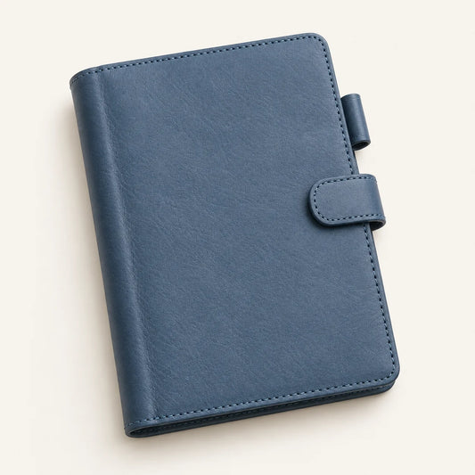 Slate blue A6 leather notebook cover with side tab, closed view