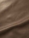 Taupe surface with fine shallow grain and a soft rounded fold