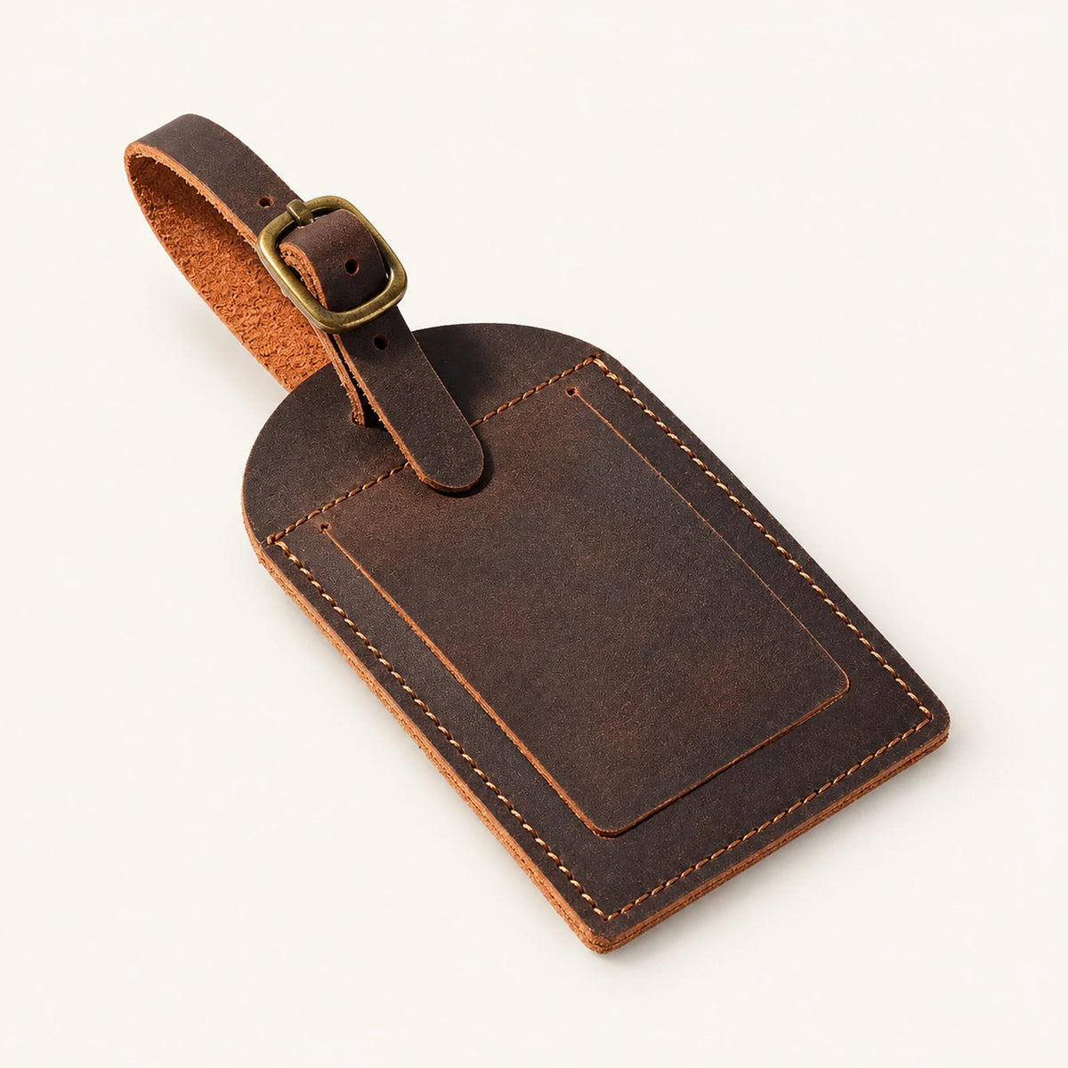 Dark brown crazy horse cowhide luggage tag with arched top, privacy flap and detachable buckle strap