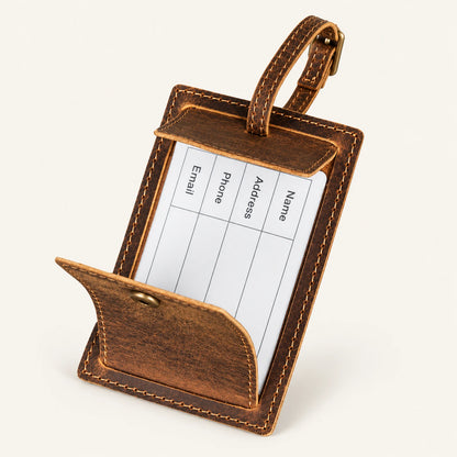 Open snap privacy cover with blank contact card window on the rectangular leather luggage tag