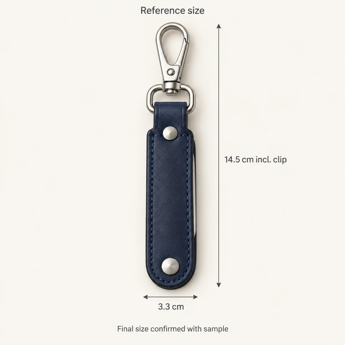 Reference keyring dimensions of 14.5 centimetres including clip by 3.3 centimetres closed width; final size confirmed with sample