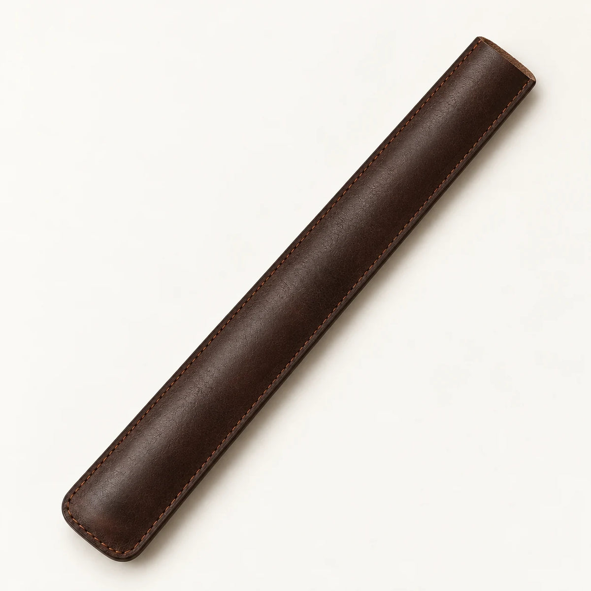 Empty rear view of the long stitched leather drumstick holder