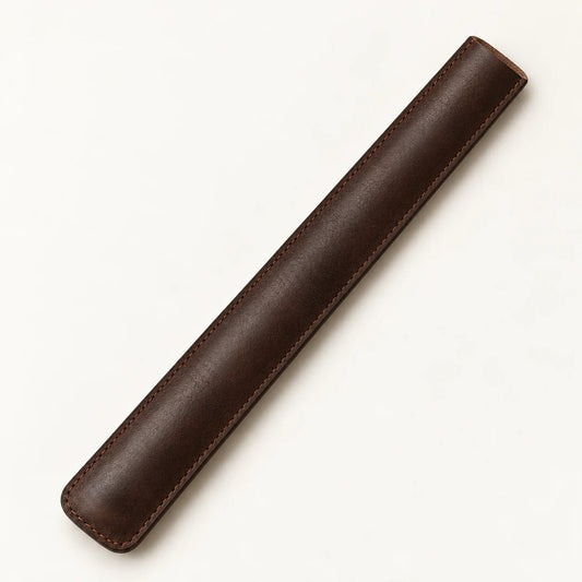 Empty rear view of the long stitched leather drumstick holder