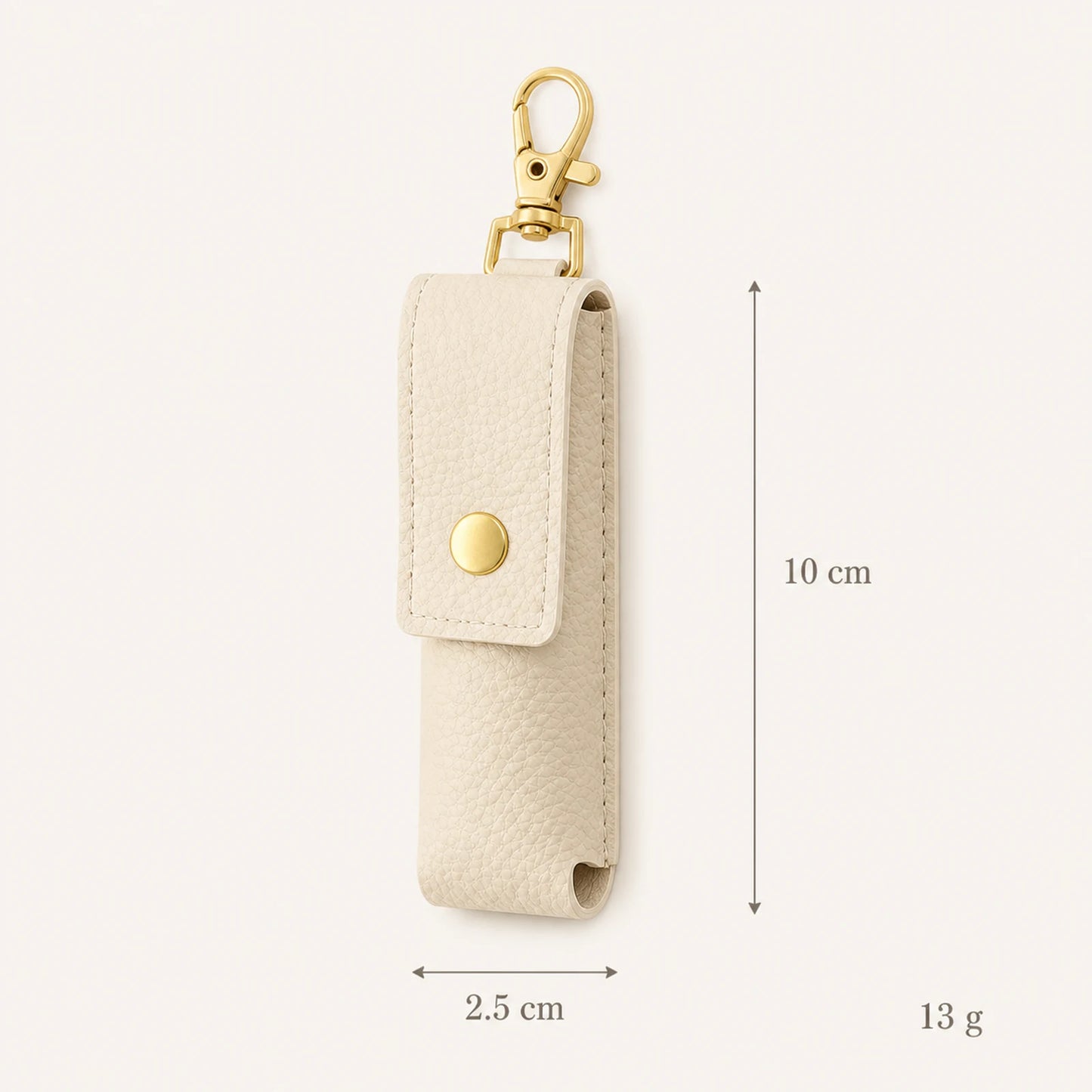 Lipstick holder keychain size guide showing 10 cm height, 2.5 cm width and 13 g reference weight
