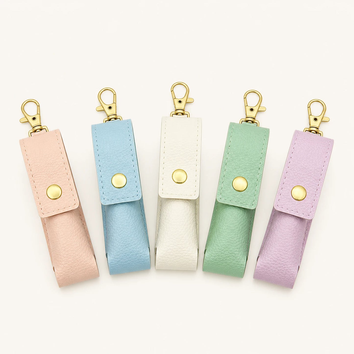 Five macaron color directions for the customizable lipstick holder keychain