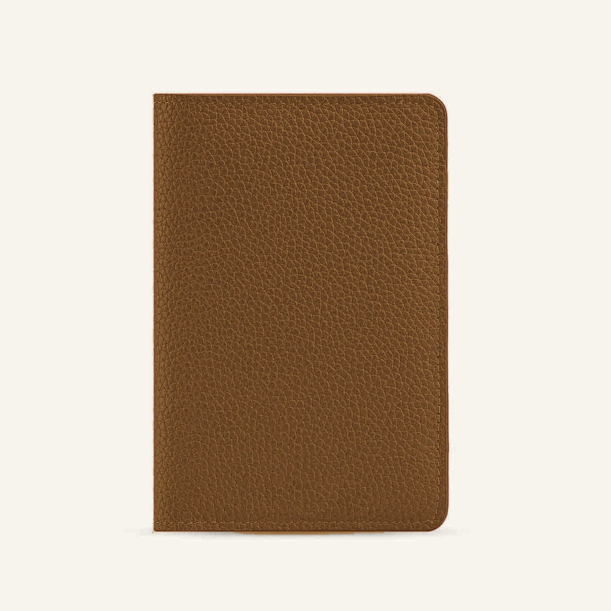 Brown pebbled leather passport holder showing a color option for private-label programs