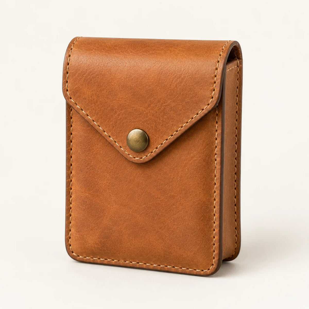Honey-tan single-deck leather playing card case with envelope flap and snap