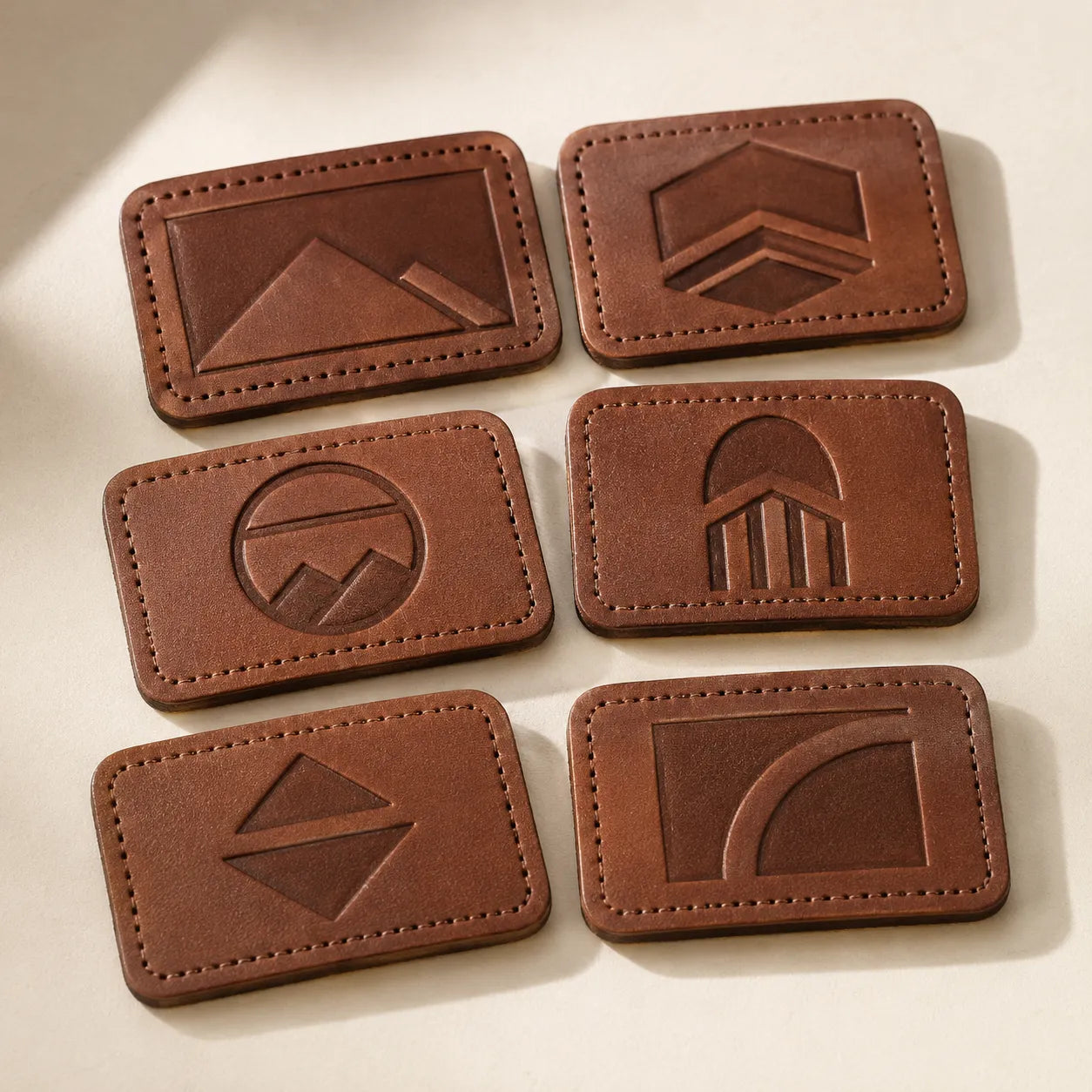 Custom logo leather hat patches concept sample for OEM ODM production