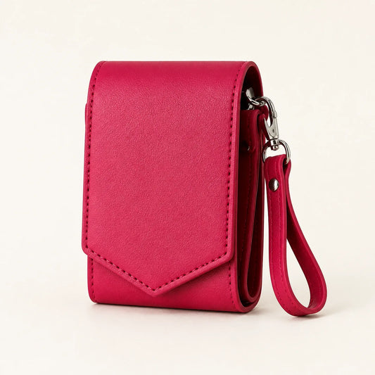 Raspberry pink multi-slot lipstick case with mirror and detachable wrist strap, front view