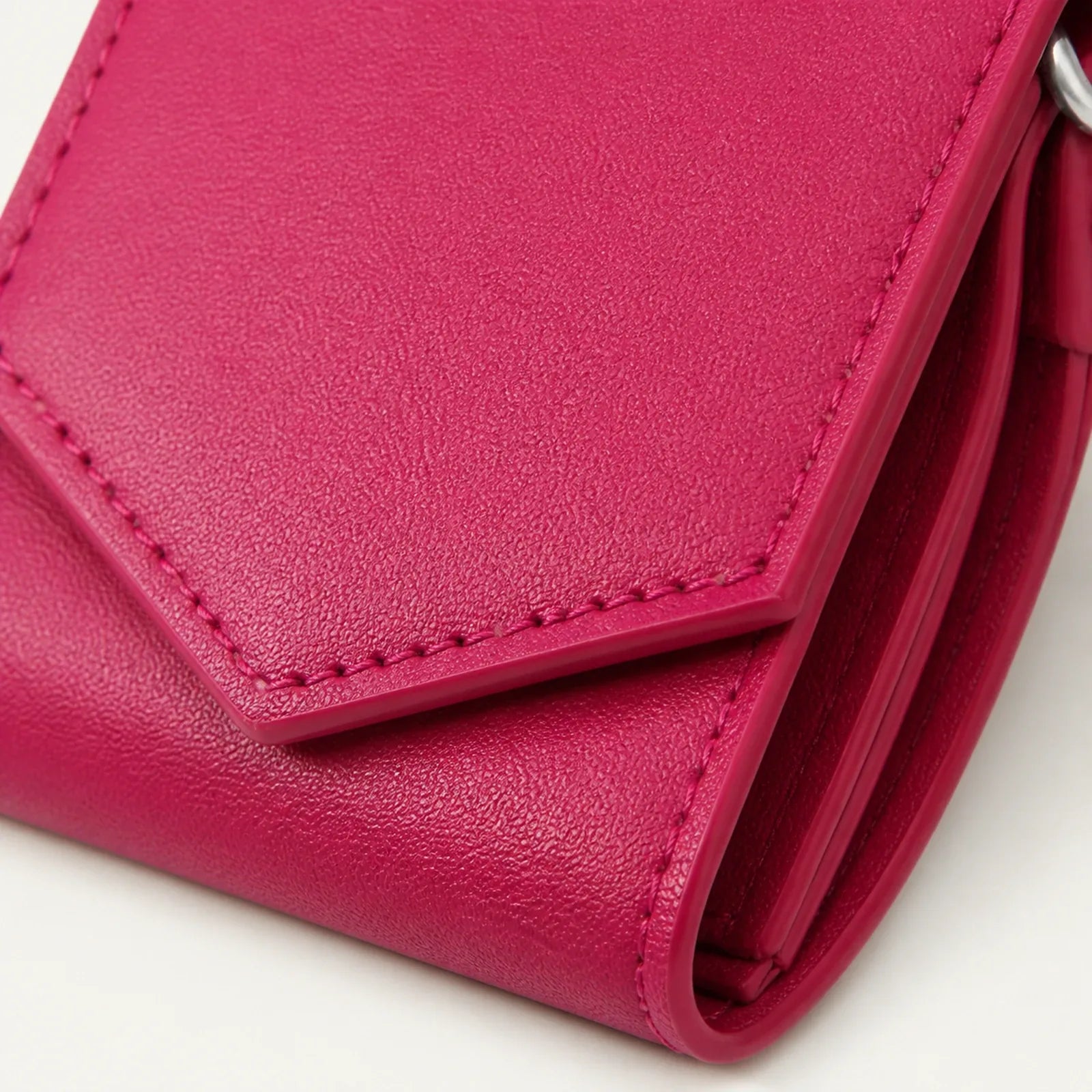 Close-up of fine-grain reference material and matching edge stitching
