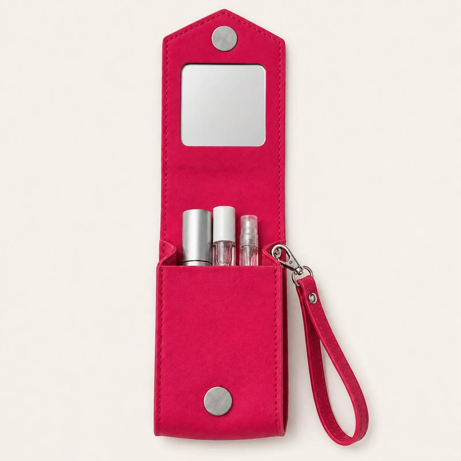 Open lipstick case showing square mirror and three cosmetic compartments