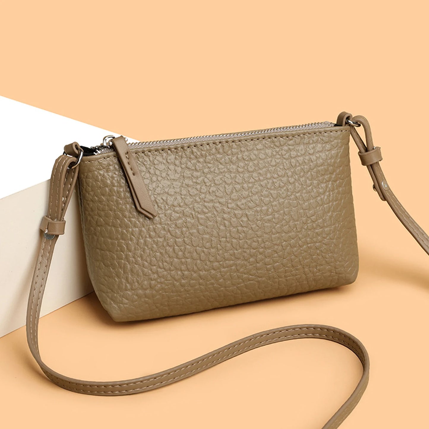 Pebbled Slim Crossbody Bag custom OEM reference 296FSC5102 - angled view