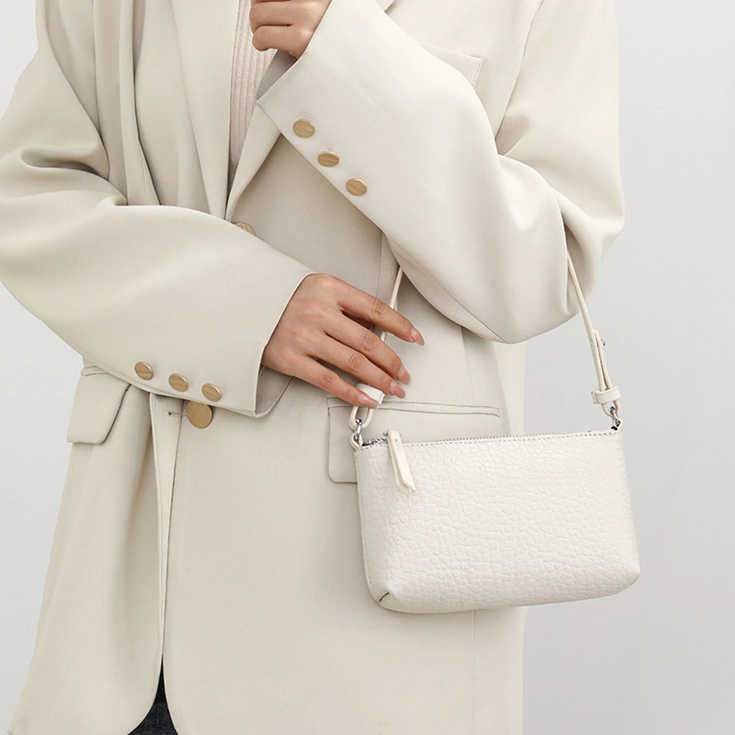 Pebbled Slim Crossbody Bag custom OEM reference 296FSC5102 - side or carry view