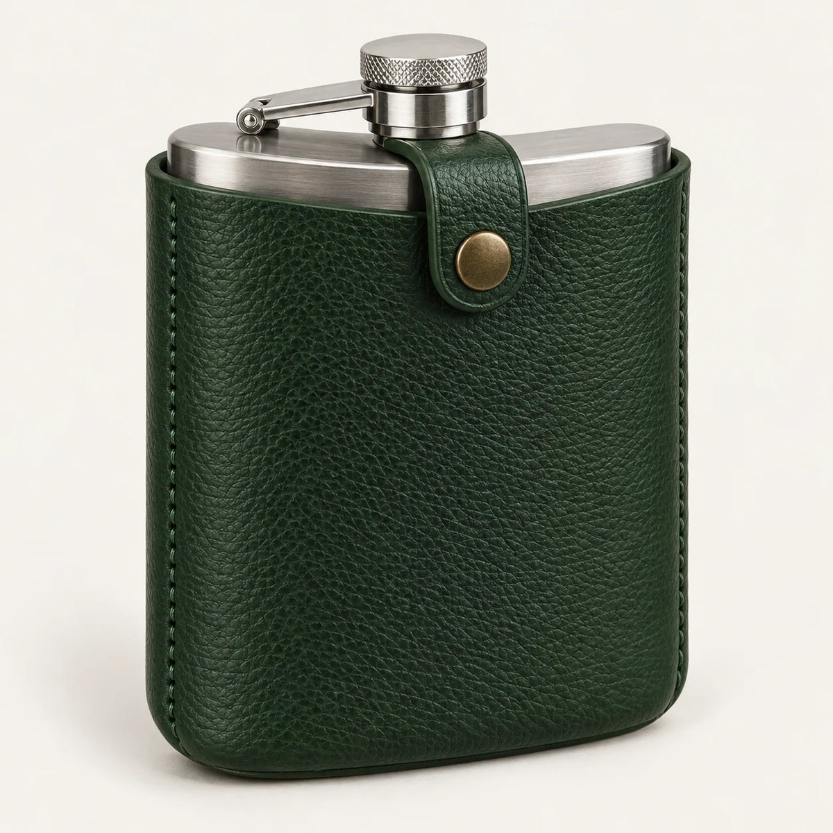 Forest-green leather flask pouch set with a front snap-retaining tab