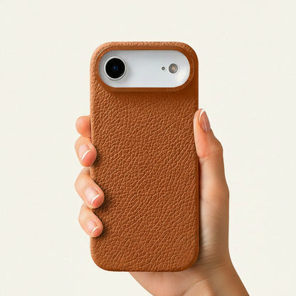 Brown top-grain leather iPhone 17 Air case in-hand view