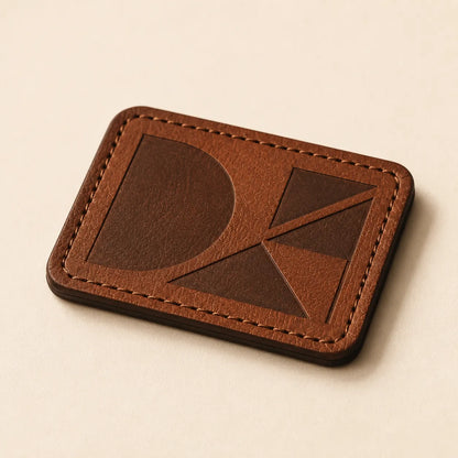 Angled view of laser engraved leather patch with clean cut edges