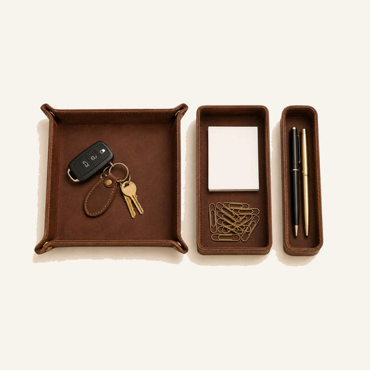 Top-down view of leather valet tray pen tray and small desk organizer pieces