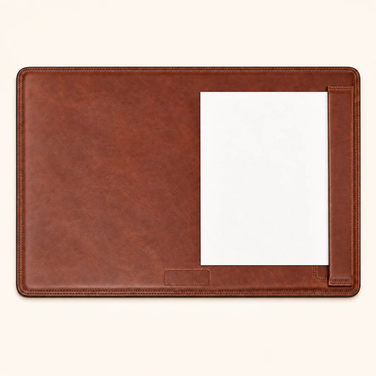 Top view of leather desk pad with A4 sheet held by flat side rail
