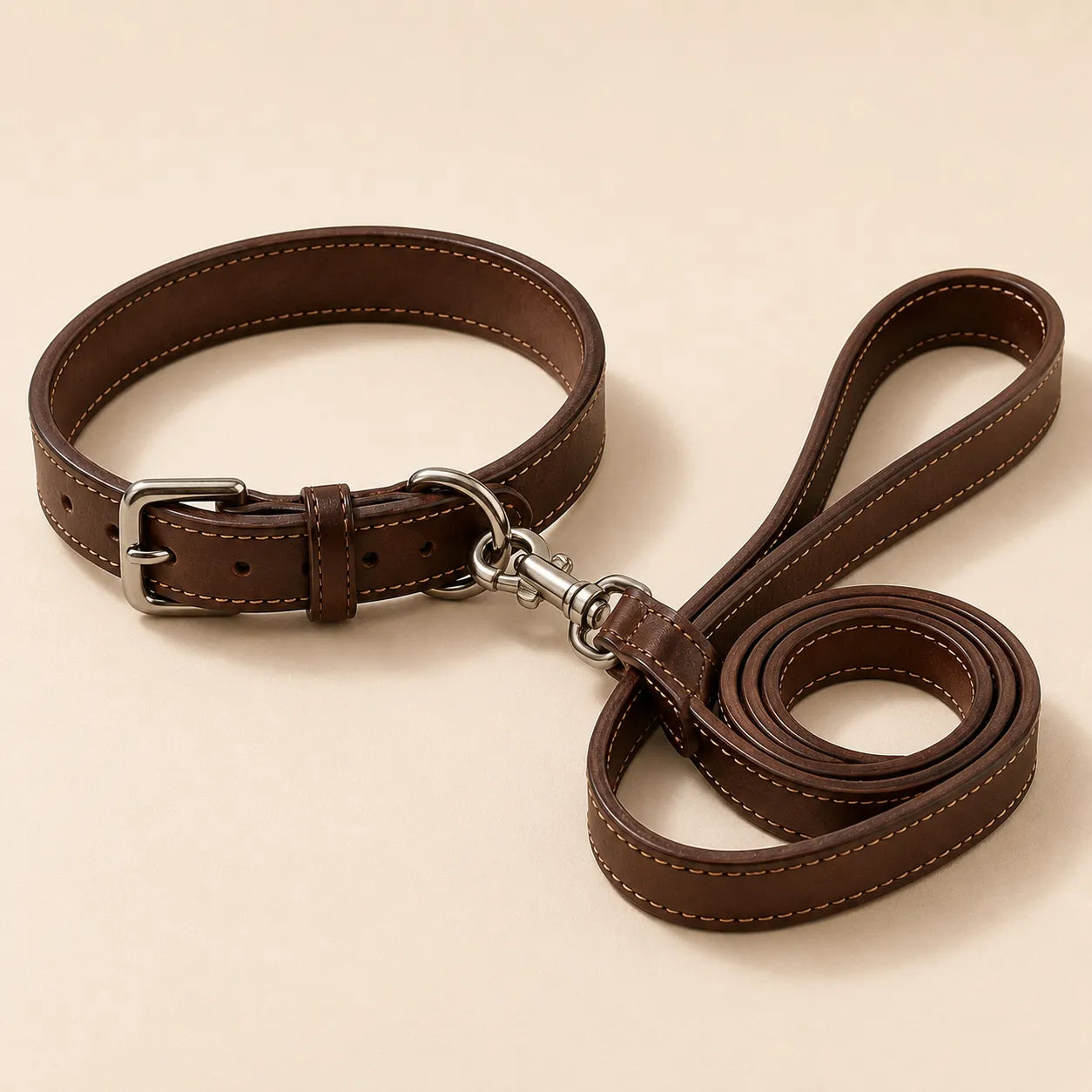 Angled view of matching leather dog collar and leash set