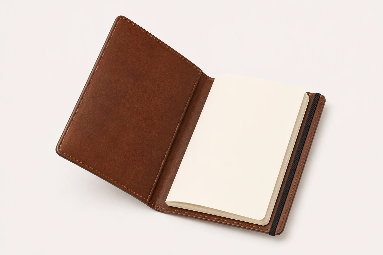 Angled leather journal cover with blank insert and elastic band structure