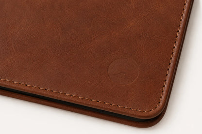 Blank debossing area on leather journal cover with stitched edge