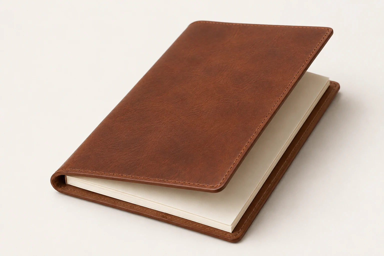 Angled leather menu notebook cover with blank cream paper insert