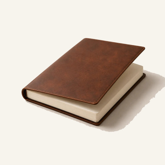 Angled leather sketchbook cover with thick blank drawing paper insert