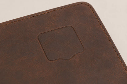 Blank debossing area on brown leather travel journal cover