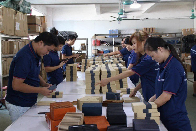 Aarons Leather team preparing bulk leather goods